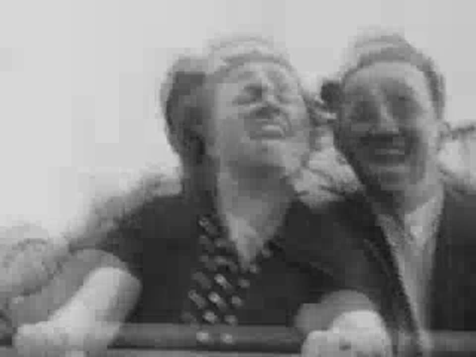 A couple laughing at Coney Island, 1940