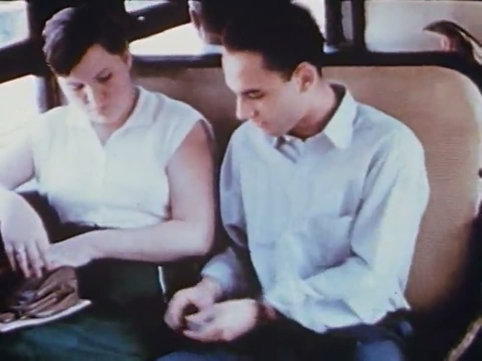 A couple on the Third Avenue El, 1950