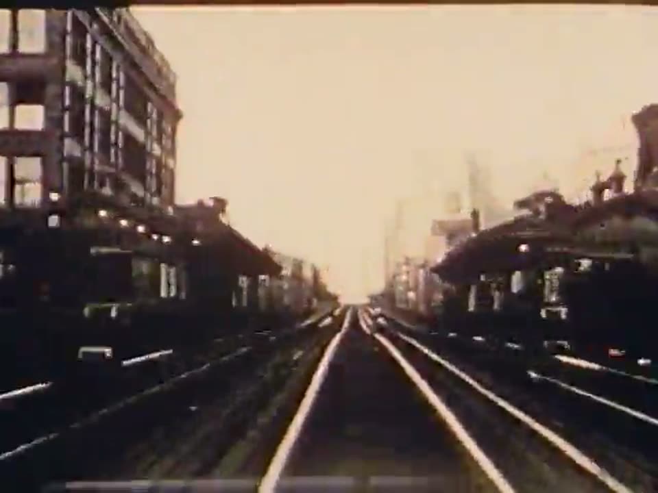 The El tracks at golden hour, 1950